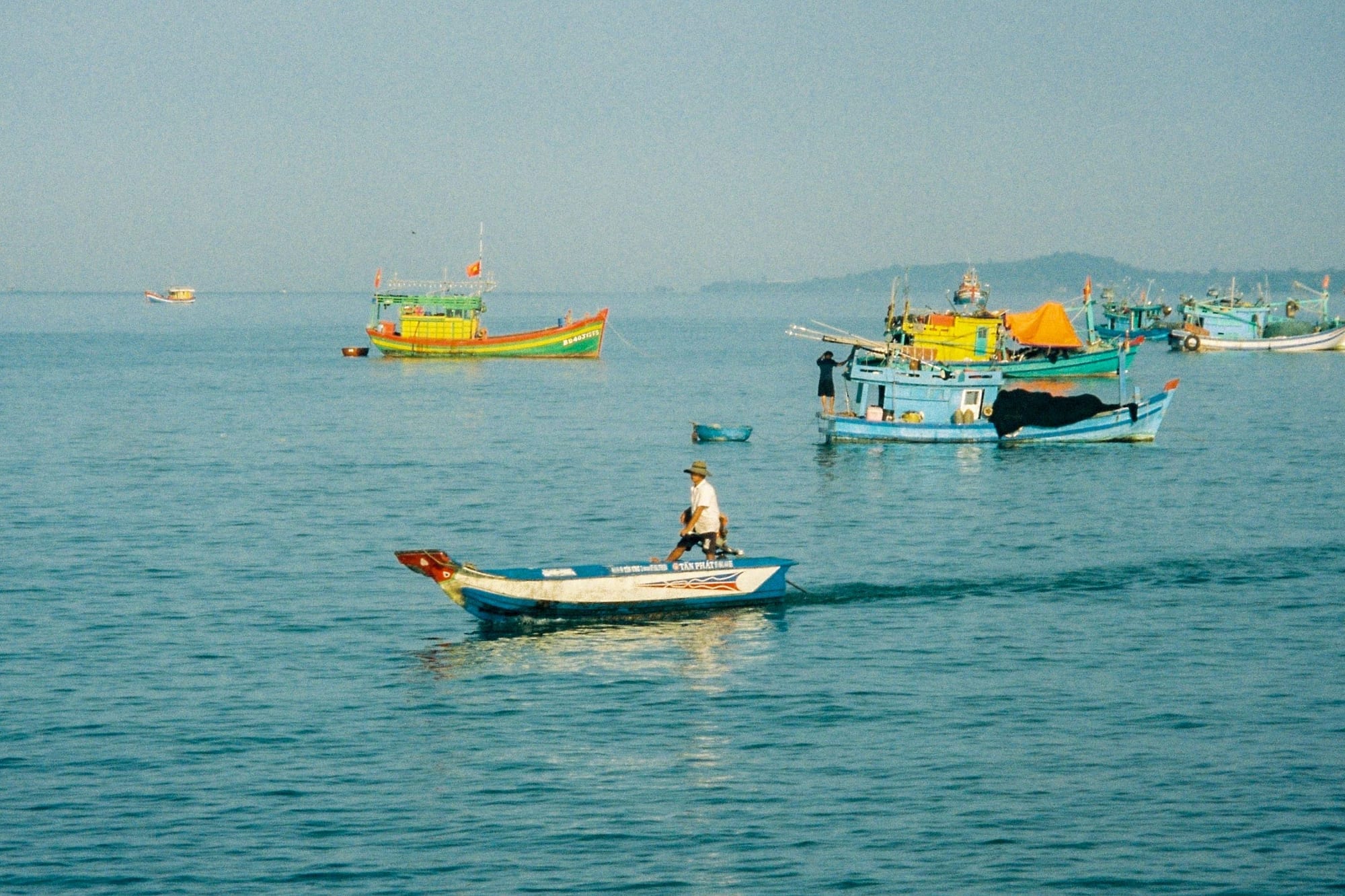 Traditional wooden fishing boats on the calm sea off the northwest coast of Phú Quốc near Gành Dầu